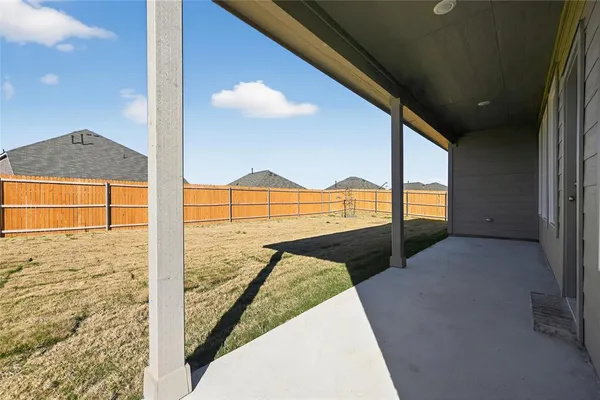 a big room with table and chairs