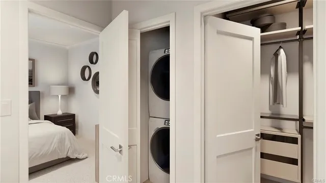 a bedroom with a bed and a mirror