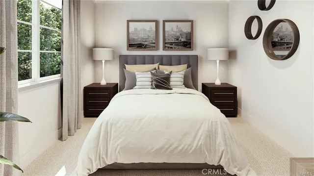 a bedroom with a bed a mirror and a window