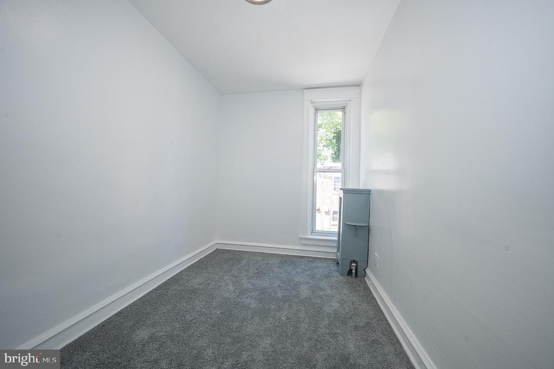 426 Hampden Road Upper Darby, PA 19082 - Photo 17 of 31 a view of an empty room with a window