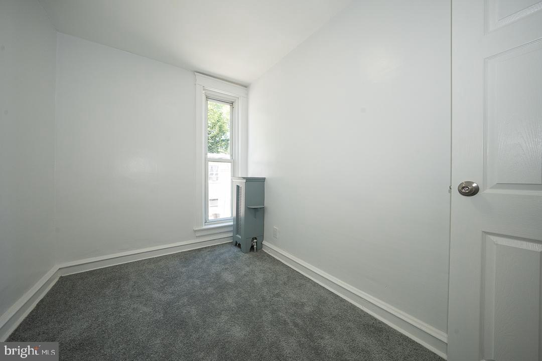 426 Hampden Road Upper Darby, PA 19082 - Photo 18 of 31 a view of an empty room with a window