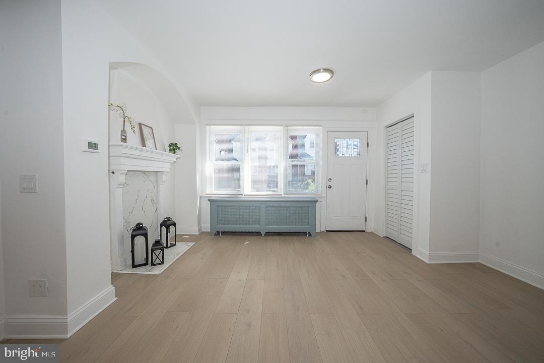 426 Hampden Road Upper Darby, PA 19082 - Photo 29 of 31 an empty room with a window and mirror