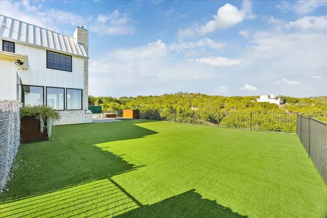 an aerial view of a house with a garden