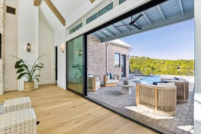 a view of a living room and a patio
