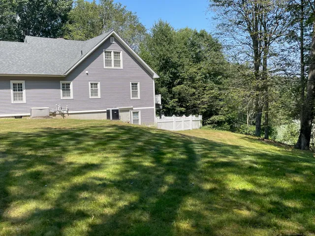a view of a swimming pool with a garden