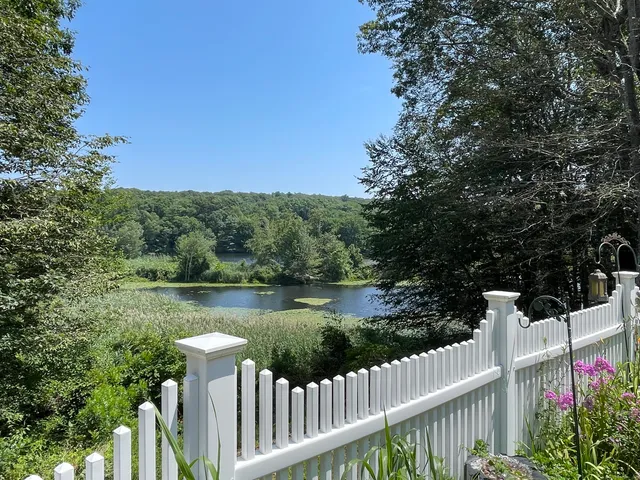 a picture of a bathroom with a bathtub