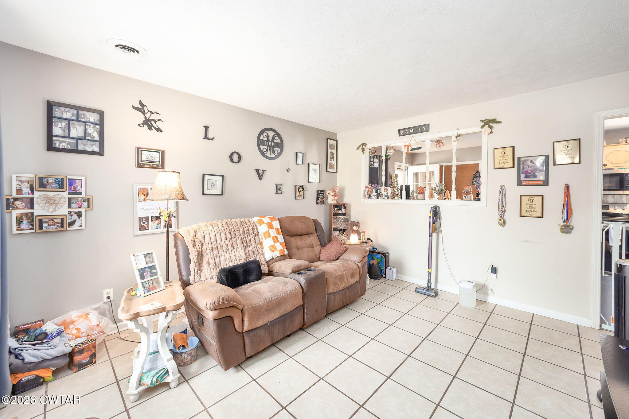 56 Ellendale Place Jackson, TN 38305 - Photo 11 of 23 a living room with furniture and a couch
