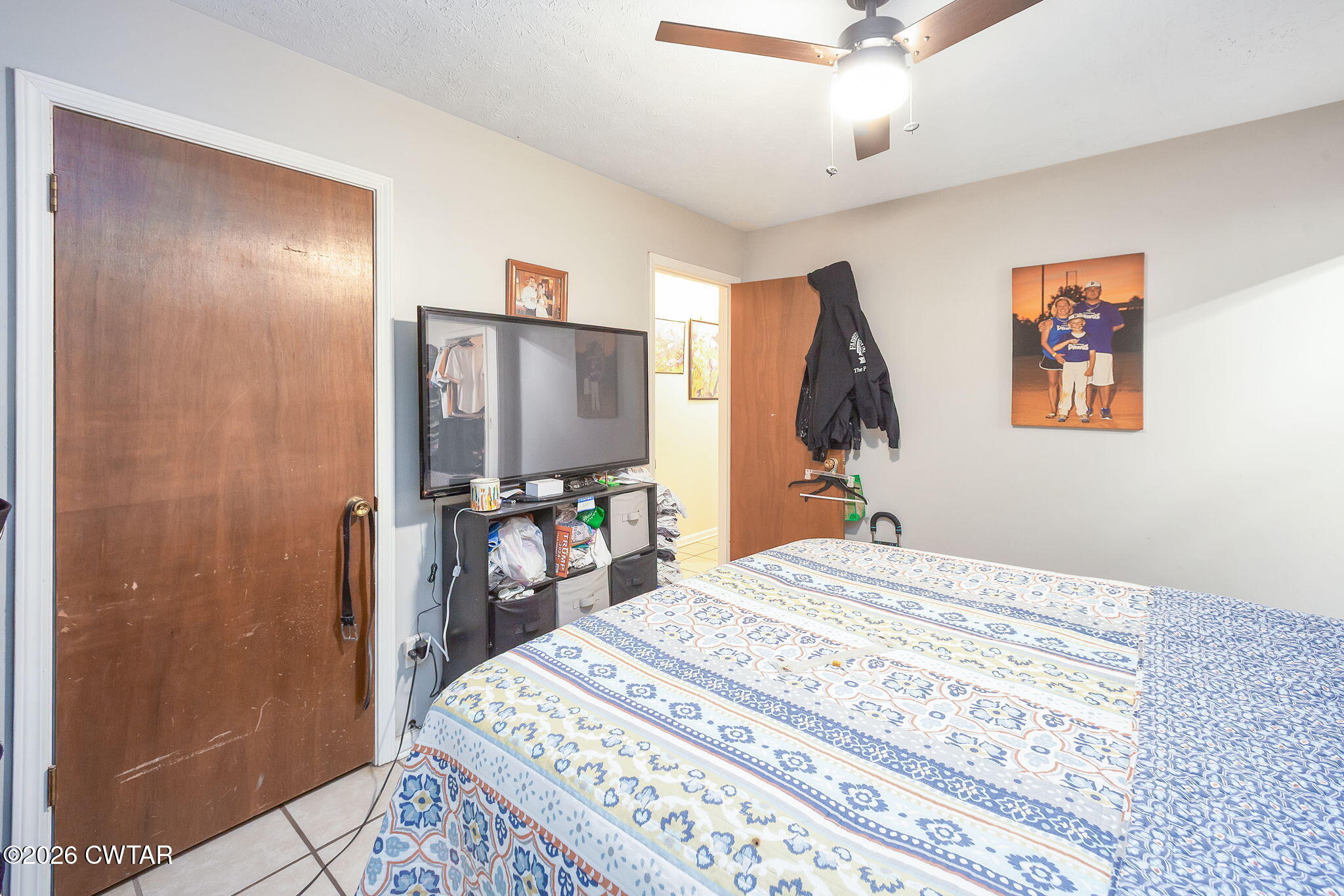 56 Ellendale Place Jackson, TN 38305 - Photo 13 of 23 a bedroom with a bed and a mirror
