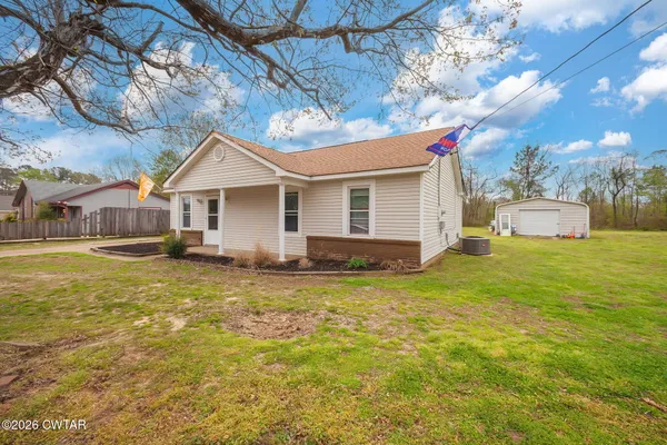 a house view with a garden space