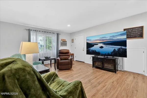 a bedroom with furniture and a bed