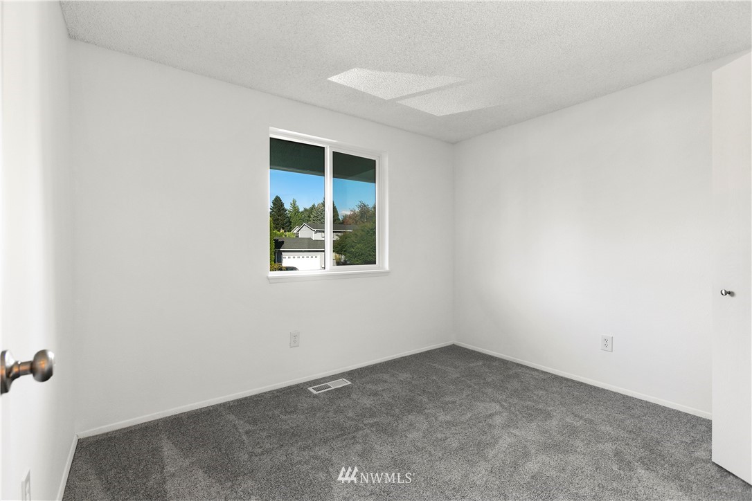 17335 159th Avenue Southeast Renton, WA 98058 - Photo 15 of 35 an empty room with a window