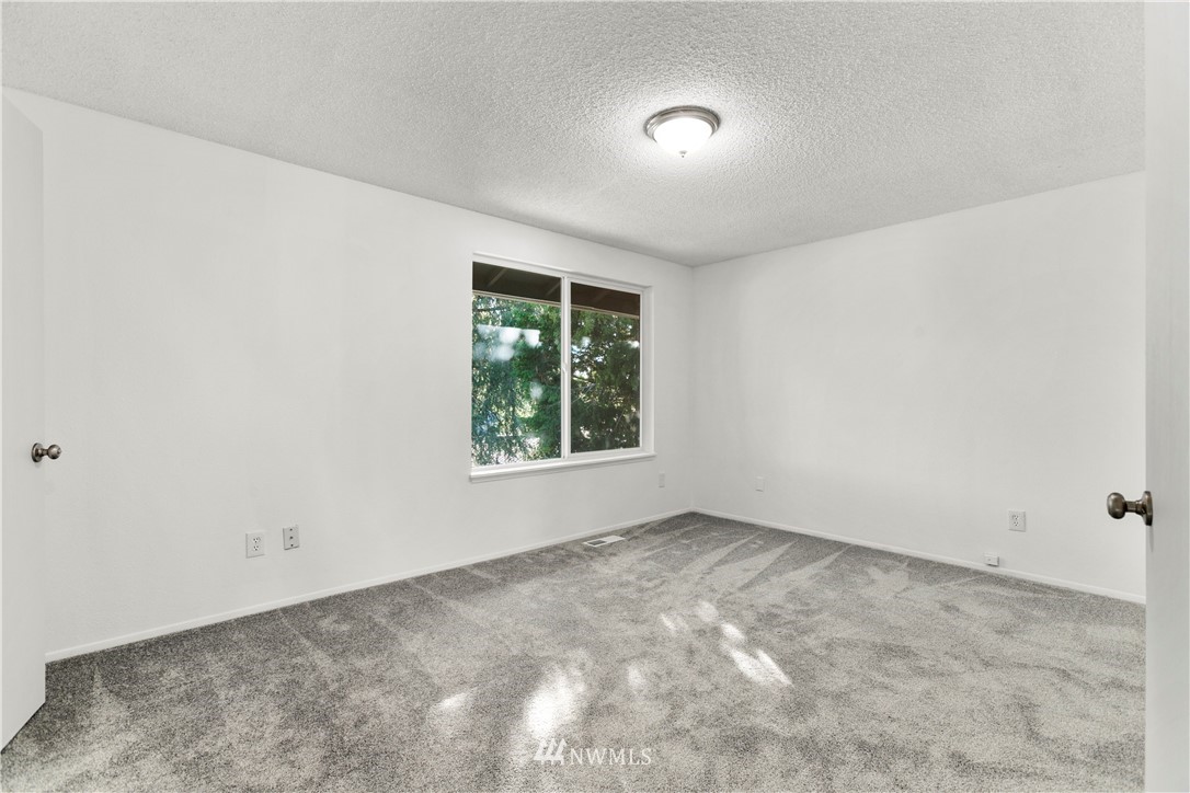 17335 159th Avenue Southeast Renton, WA 98058 - Photo 17 of 35 an empty room with a window
