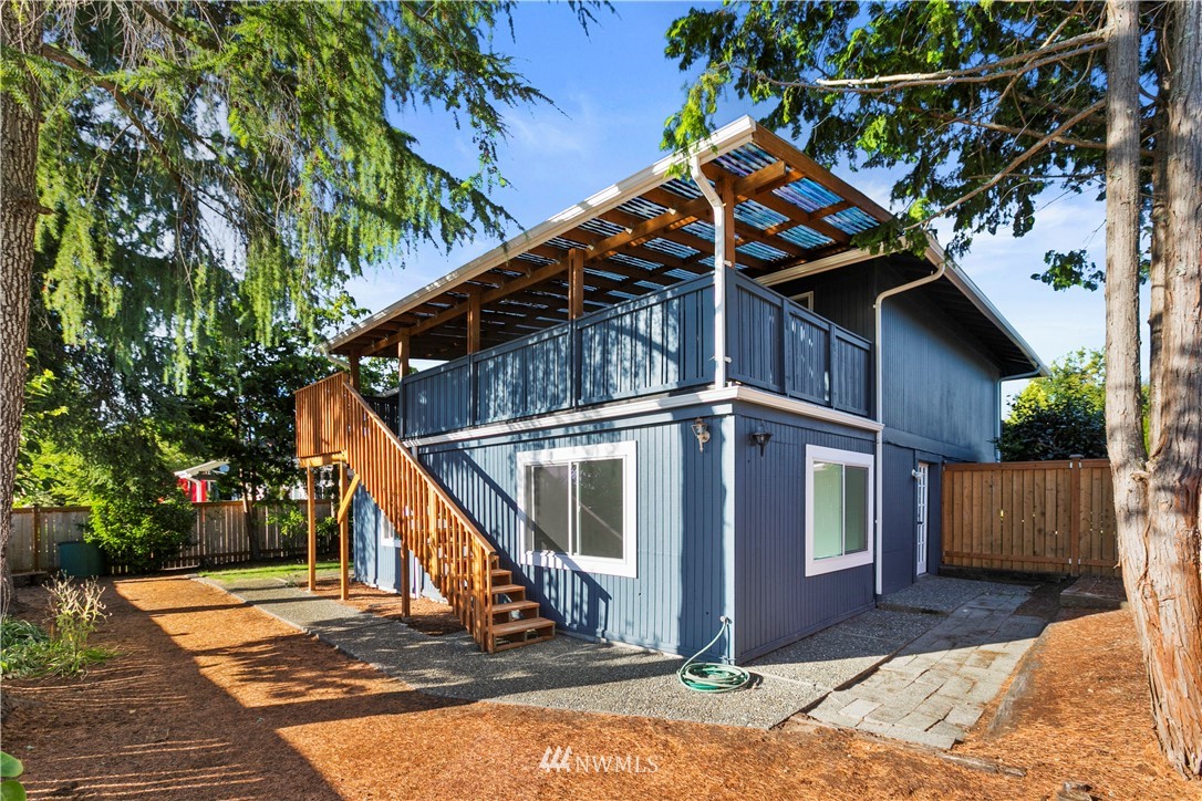17335 159th Avenue Southeast Renton, WA 98058 - Photo 21 of 35 a view of a house with a small yard