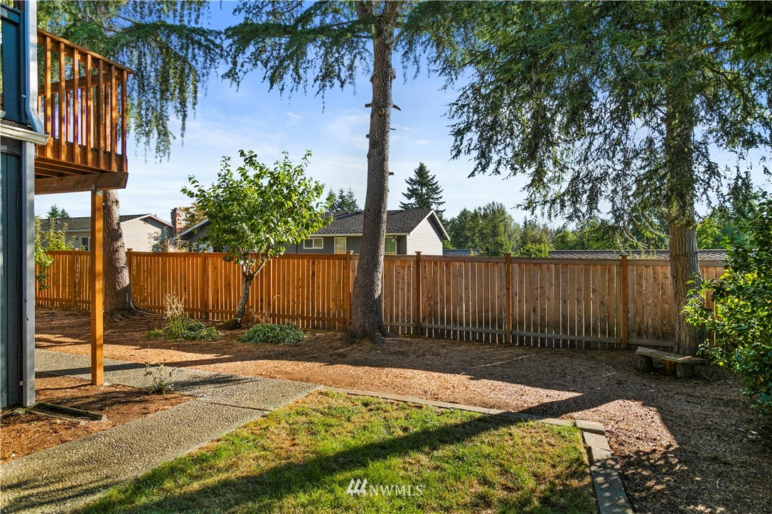 17335 159th Avenue Southeast Renton, WA 98058 - Photo 23 of 35 a front view of a house having yard