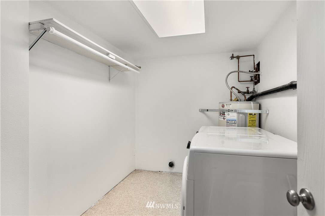 17335 159th Avenue Southeast Renton, WA 98058 - Photo 29 of 35 a utility room with dryer and washer