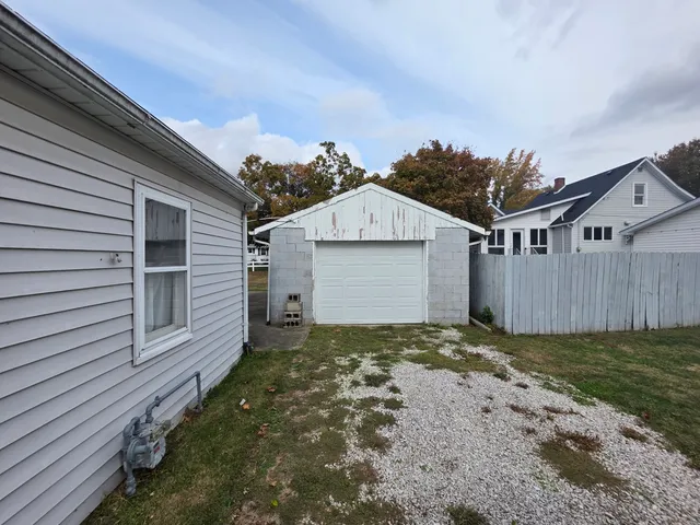 a view of a backyard of the house