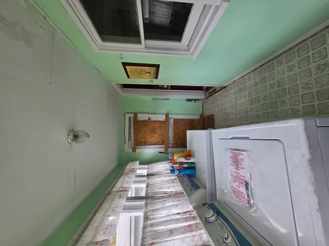 a view of a yard with car parked