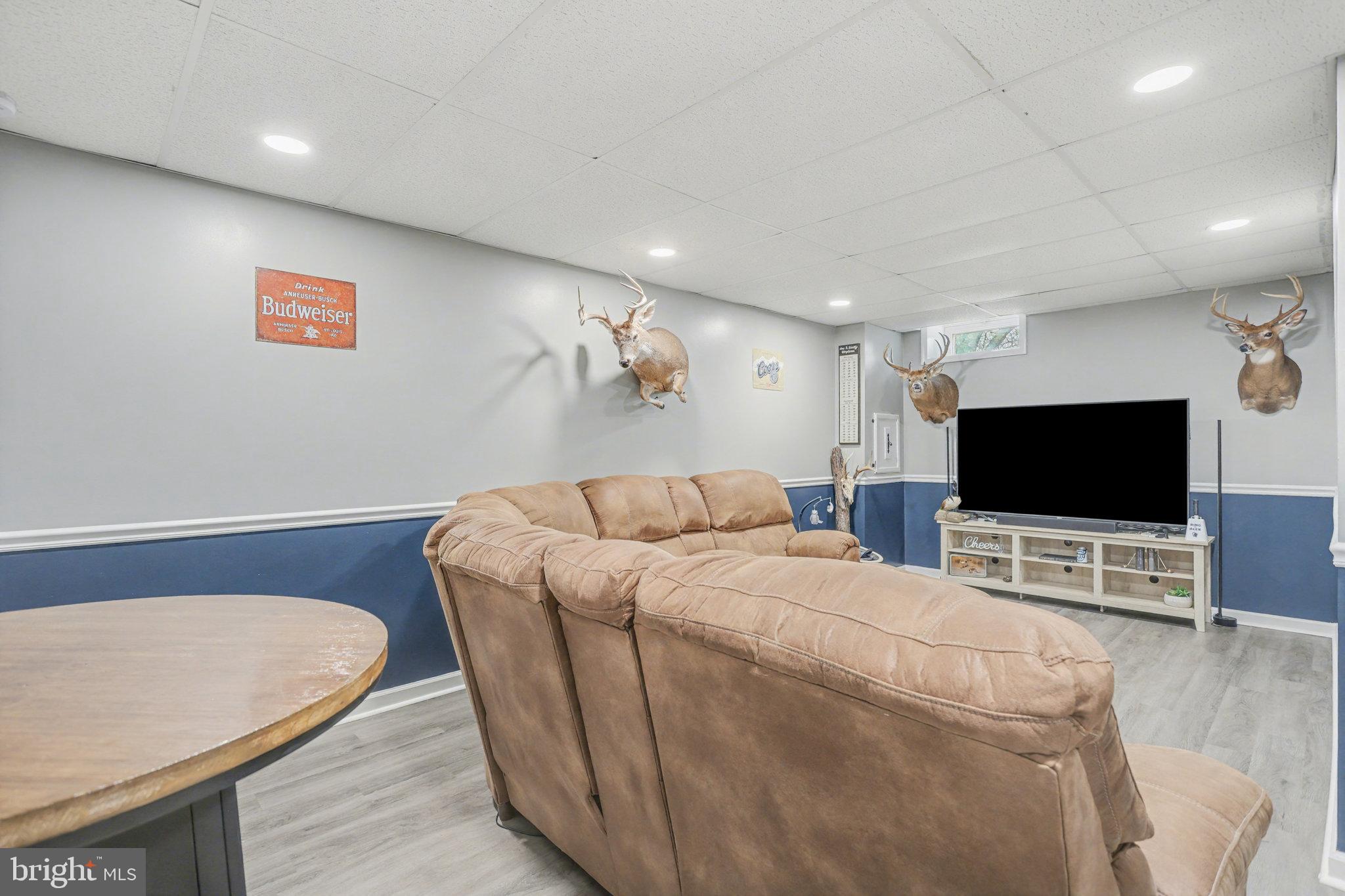 7 Meadow Lane Hanover, PA 17331 - Photo 21 of 31 a living room with furniture and a flat screen tv