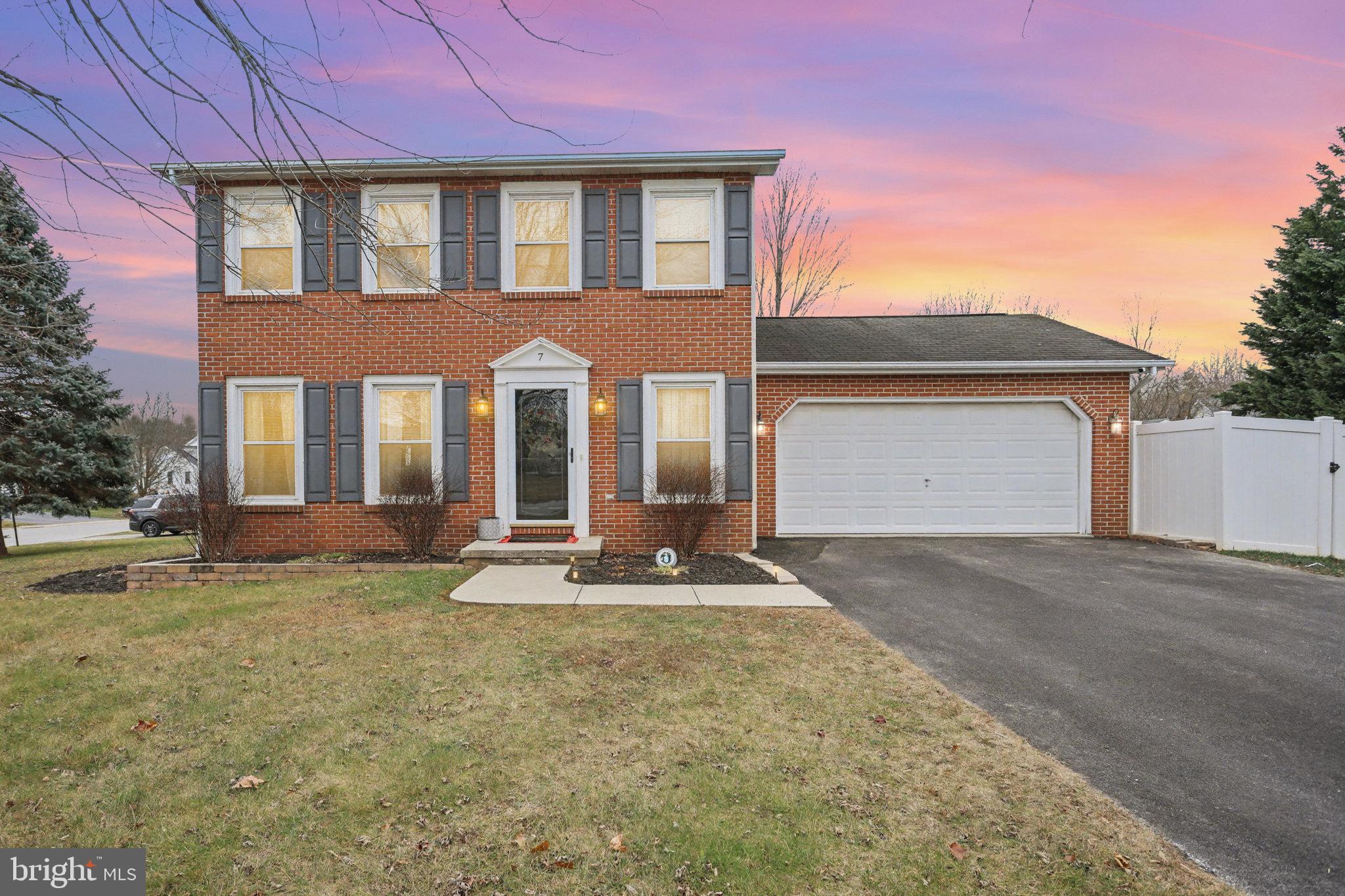 7 Meadow Lane Hanover, PA 17331 - Photo 28 of 31 a front view of a house with a garden and yard