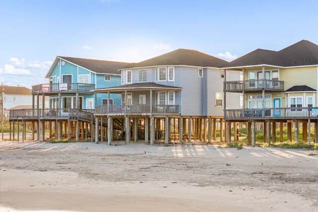 a front view of a house with a ocean view