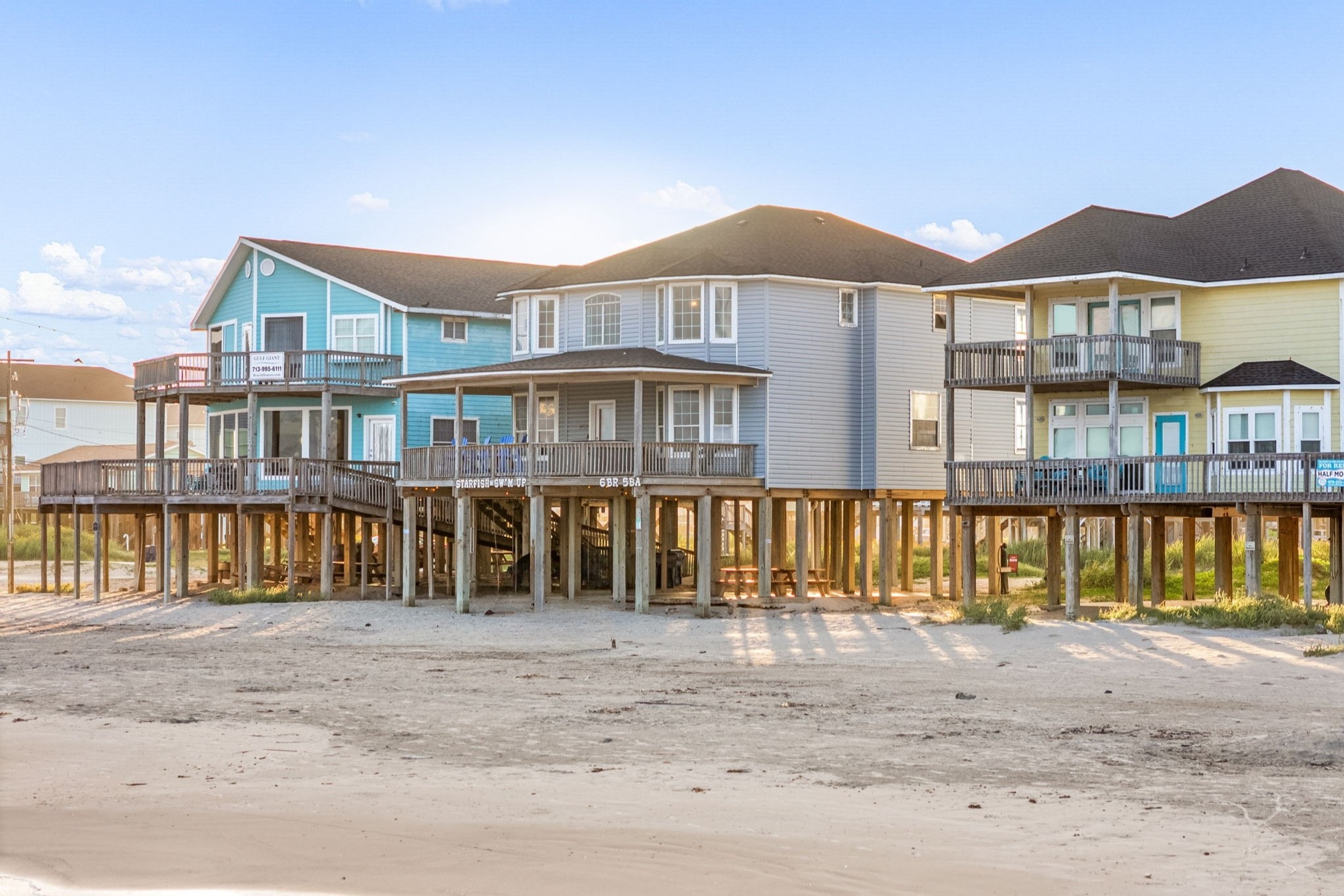 a front view of a house with a ocean view