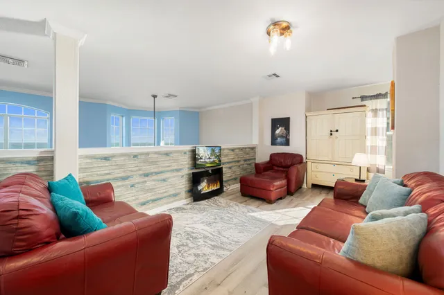 a living room with furniture and a couch