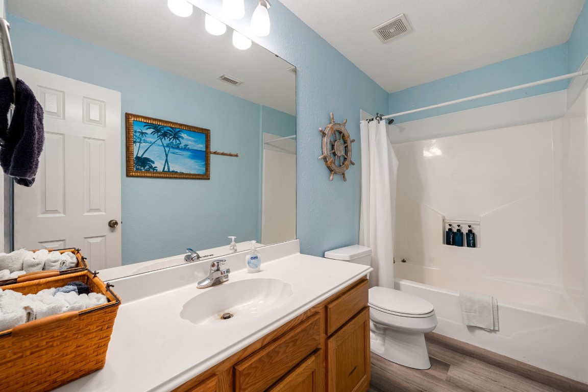 116 Starfish Street Surfside Beach, TX 77541 - Photo 38 of 49 a bathroom with a sink toilet and shower