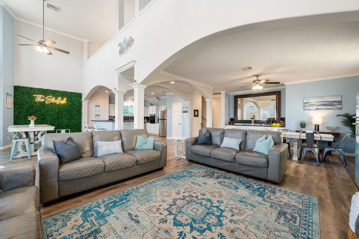116 Starfish Street Surfside Beach, TX 77541 - Photo 6 of 49 a living room with furniture and a large window