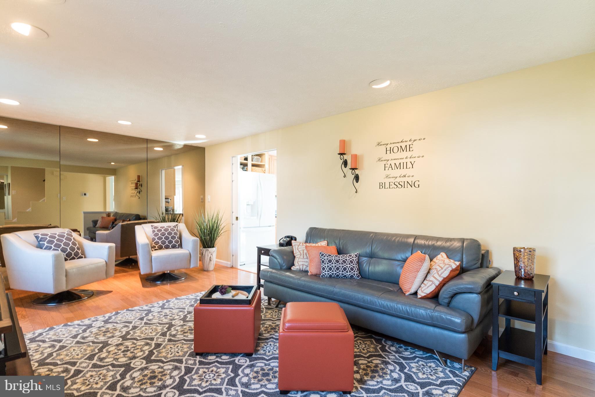 Hardwood floors and custom mirrors.