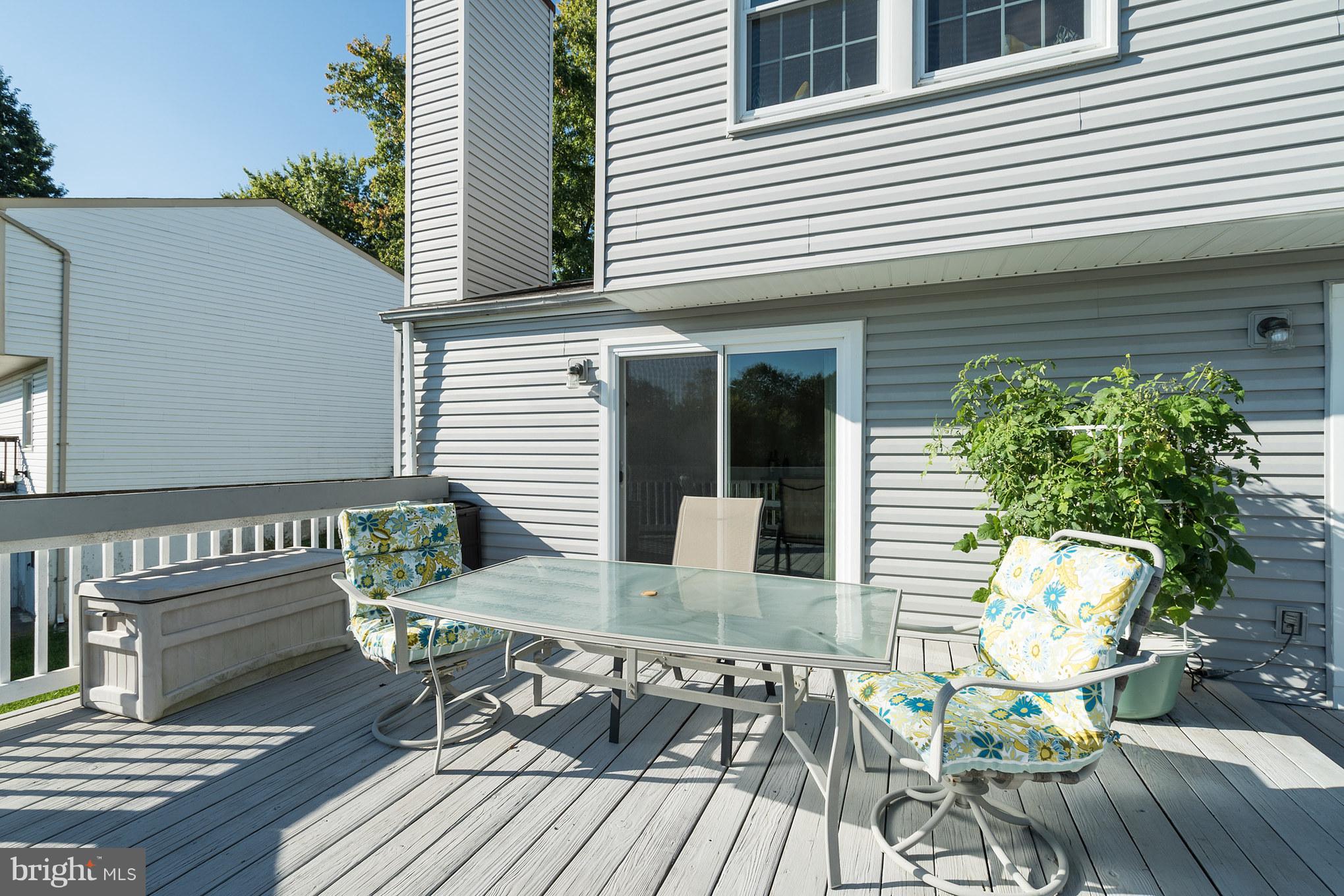 403 Rock Lodge Road Gaithersburg, MD 20877 - Photo 24 of 28 Outdoor living space with view of park.