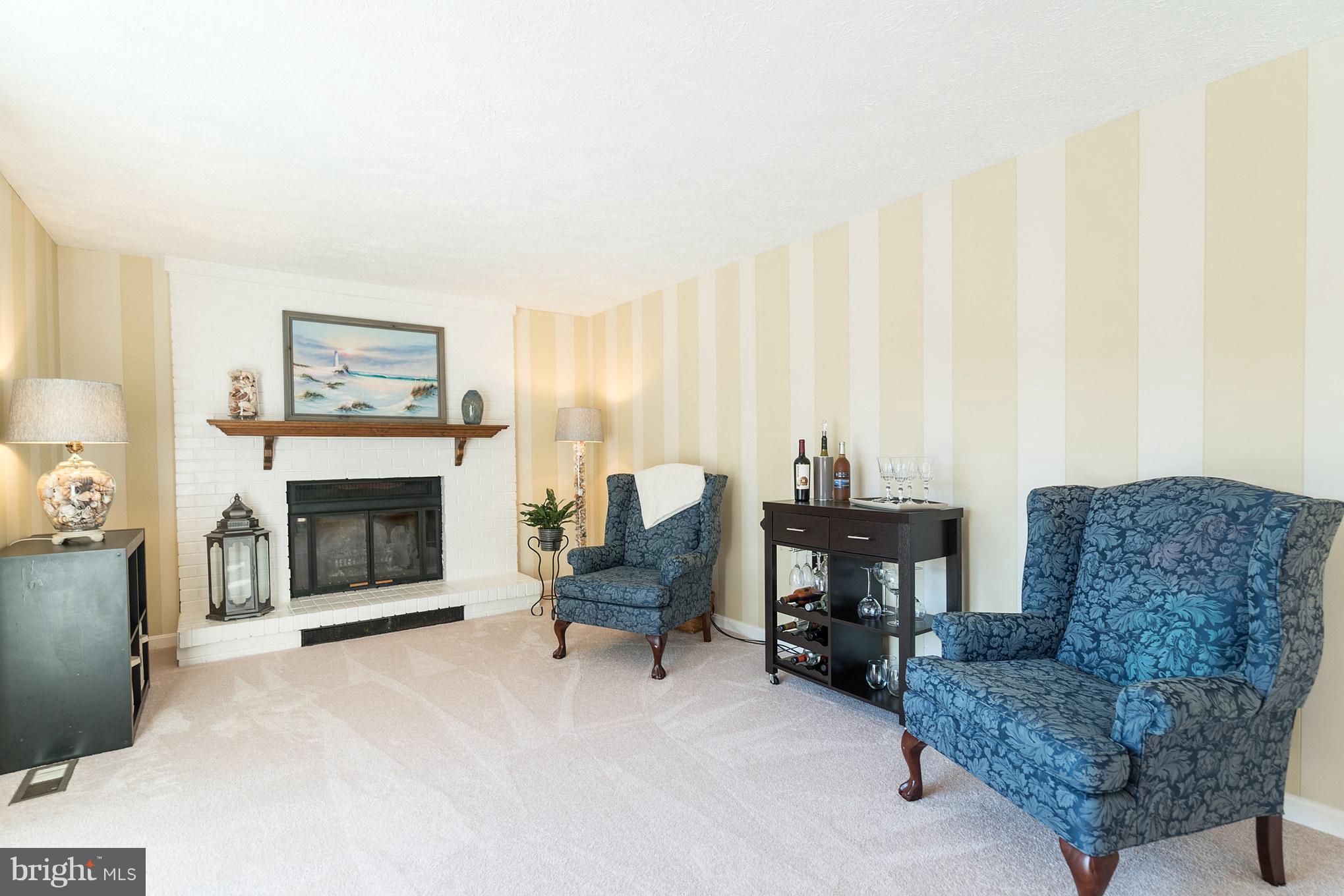 403 Rock Lodge Road Gaithersburg, MD 20877 - Photo 9 of 28 Family Room has cozy fireplace.
