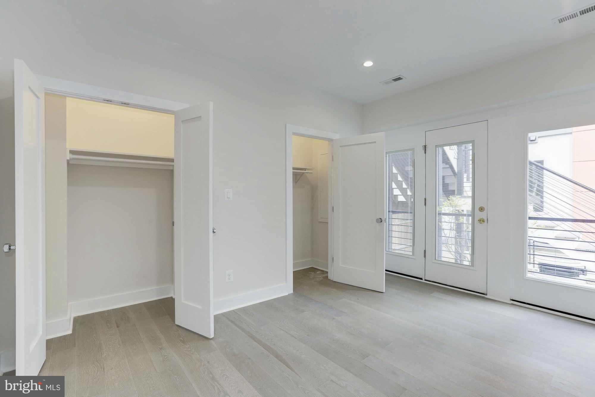 4008 Edmunds Street Northwest, Unit 9 Washington, DC 20007 - Photo 27 of 30 a view of an empty room with a window