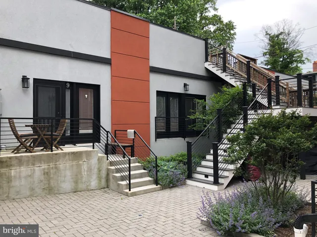 a view of a yard with car parked