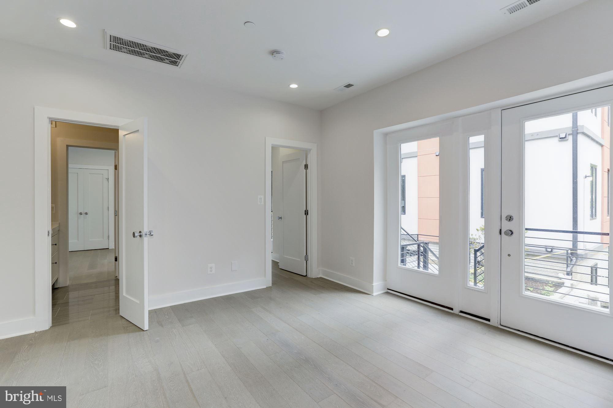 4008 Edmunds Street Northwest, Unit 9 Washington, DC 20007 - Photo 8 of 30 a view of livingroom with window