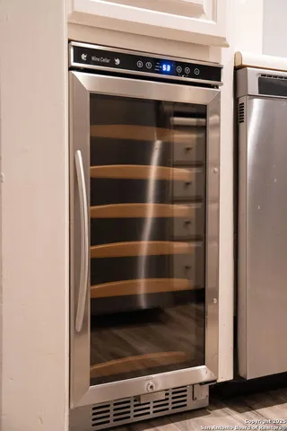 a kitchen with a sink cabinets and window