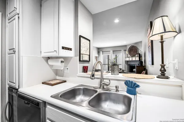 a kitchen with a stove and a microwave