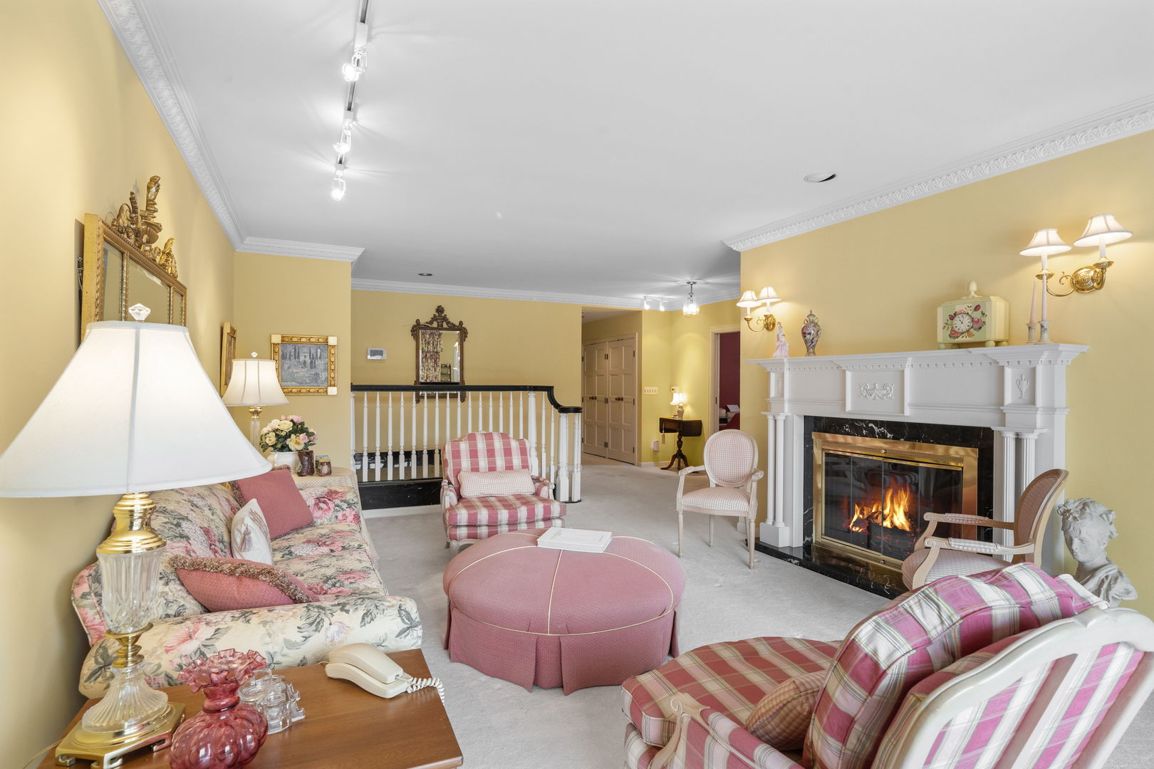 3 Oak Brook Club Drive, Unit E207 Oak Brook, IL 60523 - Photo 19 of 35 a living room with furniture and a fireplace
