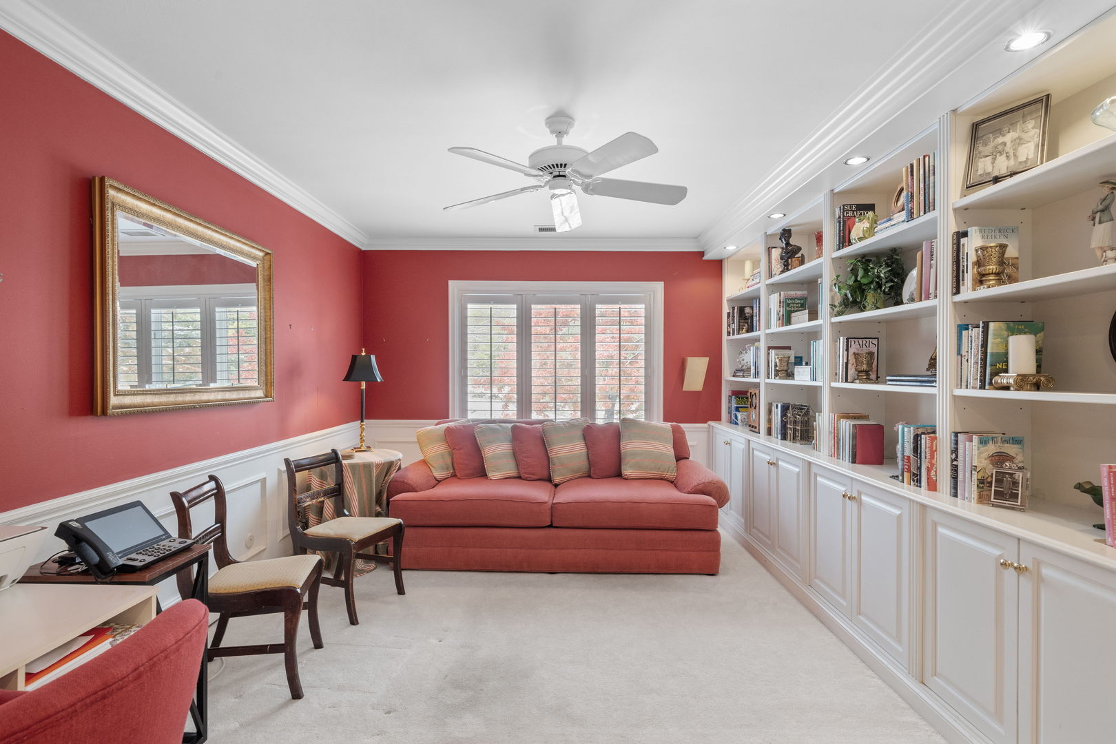 3 Oak Brook Club Drive, Unit E207 Oak Brook, IL 60523 - Photo 6 of 35 a living room with furniture and a book shelf