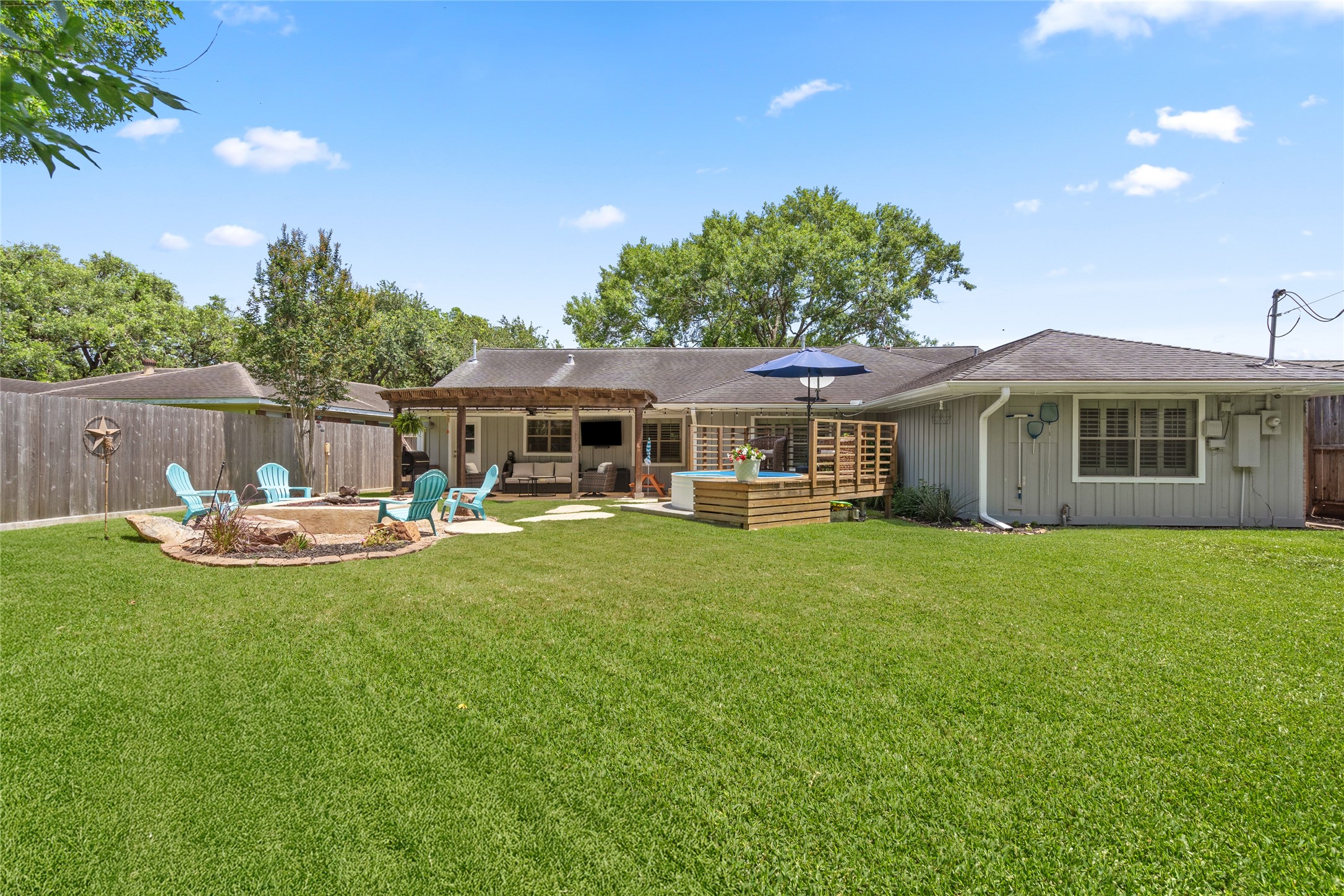 4845 Briarbend Drive Houston, TX 77035 - Photo 27 of 38 a front view of a house with a garden
