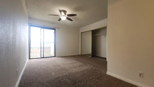 a view of empty room with windows