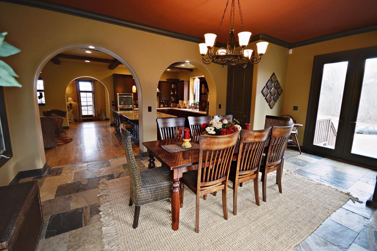 5972 Bethlehem Road Springfield, TN 37172 - Photo 13 of 29 a dining room with furniture a chandelier and wooden floor