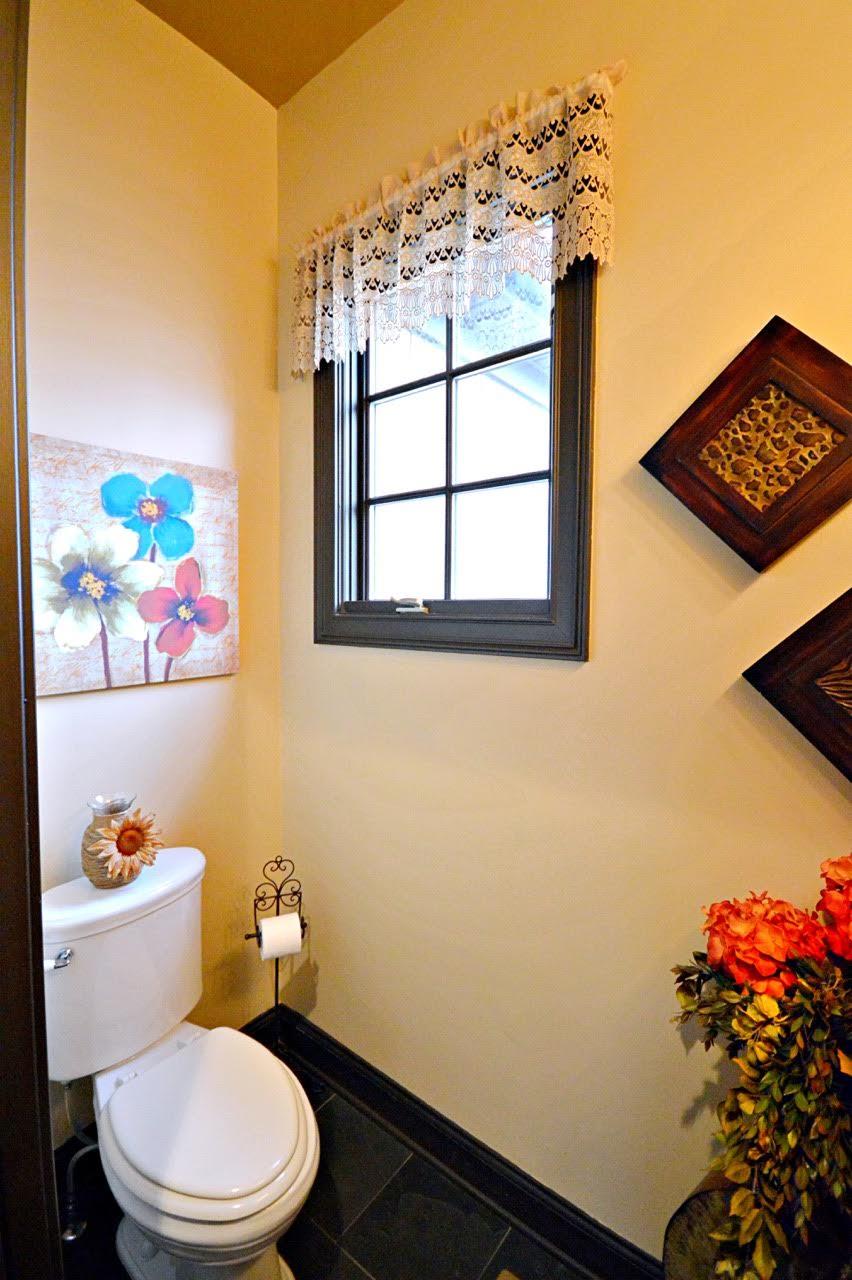 5972 Bethlehem Road Springfield, TN 37172 - Photo 26 of 29 a white toilet sitting next to a window