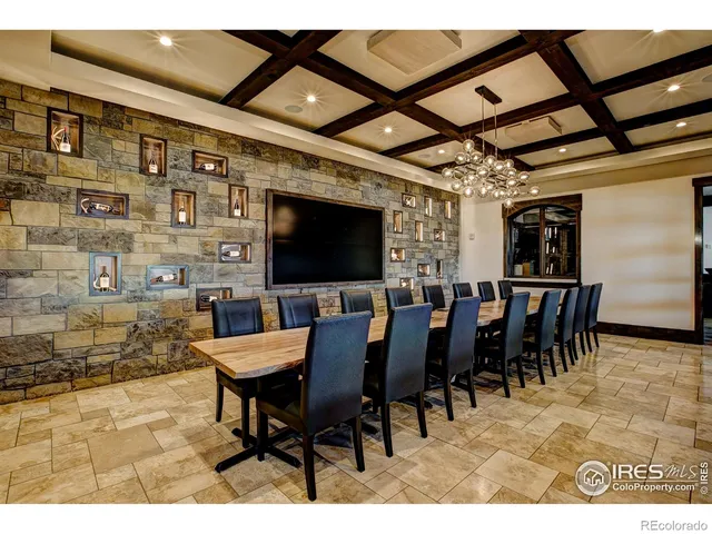 a view of swimming pool with seating area