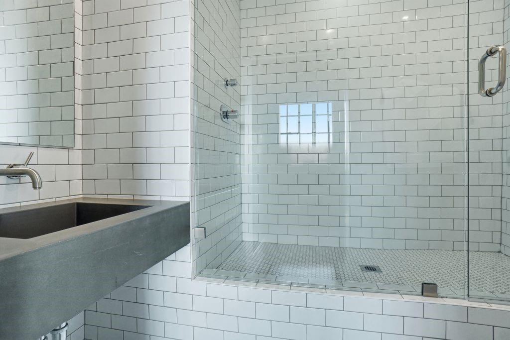 2220 Canton Street, Unit 407 Dallas, TX 75201 - Photo 27 of 39 a bathroom with a bathtub