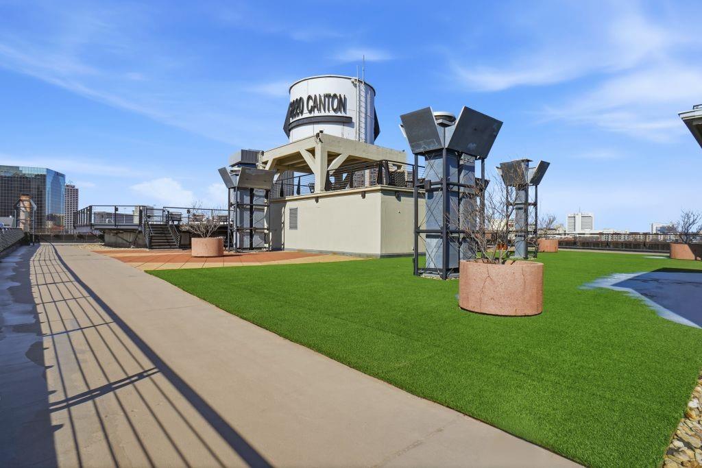 2220 Canton Street, Unit 407 Dallas, TX 75201 - Photo 30 of 39 a view of a green field with sitting area