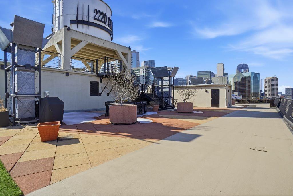 2220 Canton Street, Unit 407 Dallas, TX 75201 - Photo 31 of 39 a building outdoor space with patio furniture
