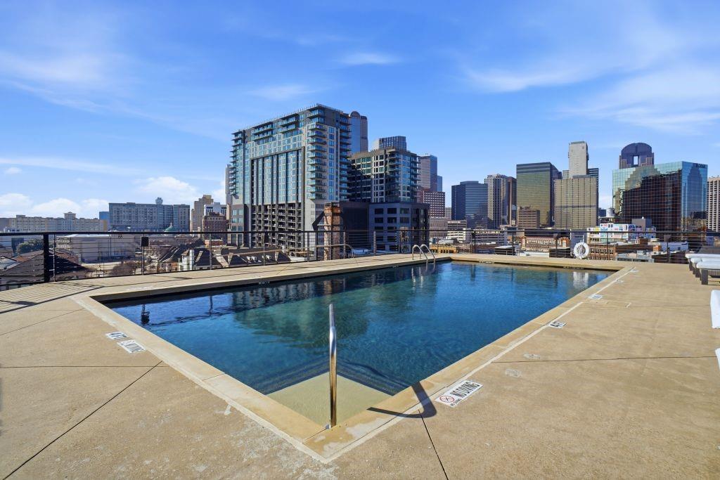 2220 Canton Street, Unit 407 Dallas, TX 75201 - Photo 33 of 39 a swimming pool with outdoor space