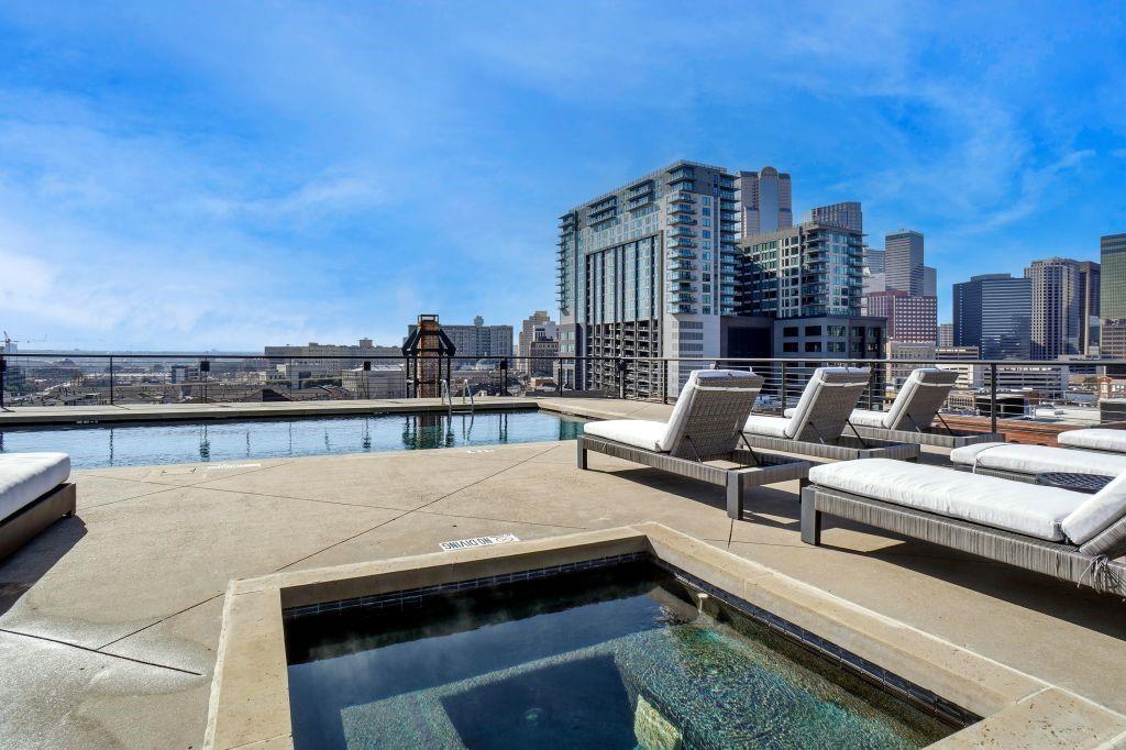2220 Canton Street, Unit 407 Dallas, TX 75201 - Photo 35 of 39 a view of roof deck with seating space and city view