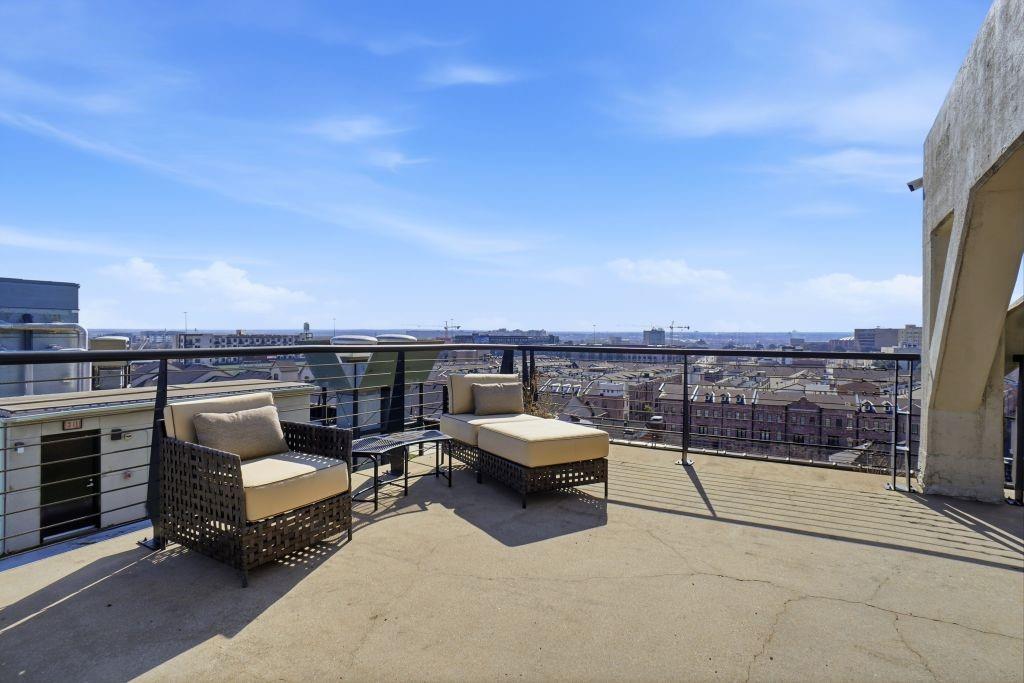 2220 Canton Street, Unit 407 Dallas, TX 75201 - Photo 37 of 39 a terrace view with sitting space and garden view