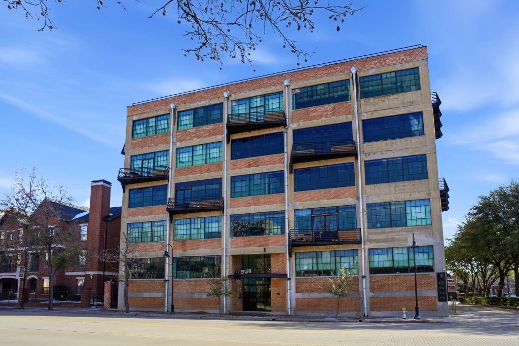 2220 Canton Street, Unit 407 Dallas, TX 75201 - Photo 7 of 39 a view of a building with a balcony